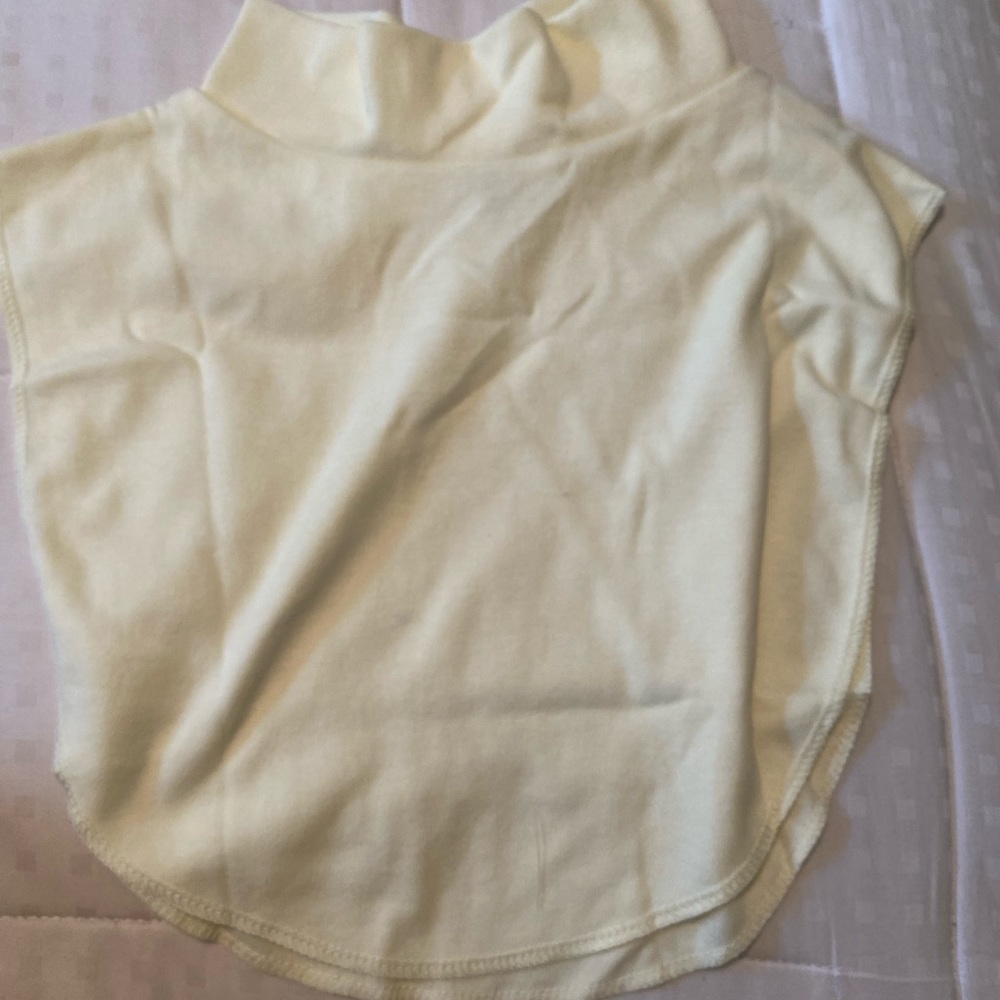 Creme colored dickey. Never worn.